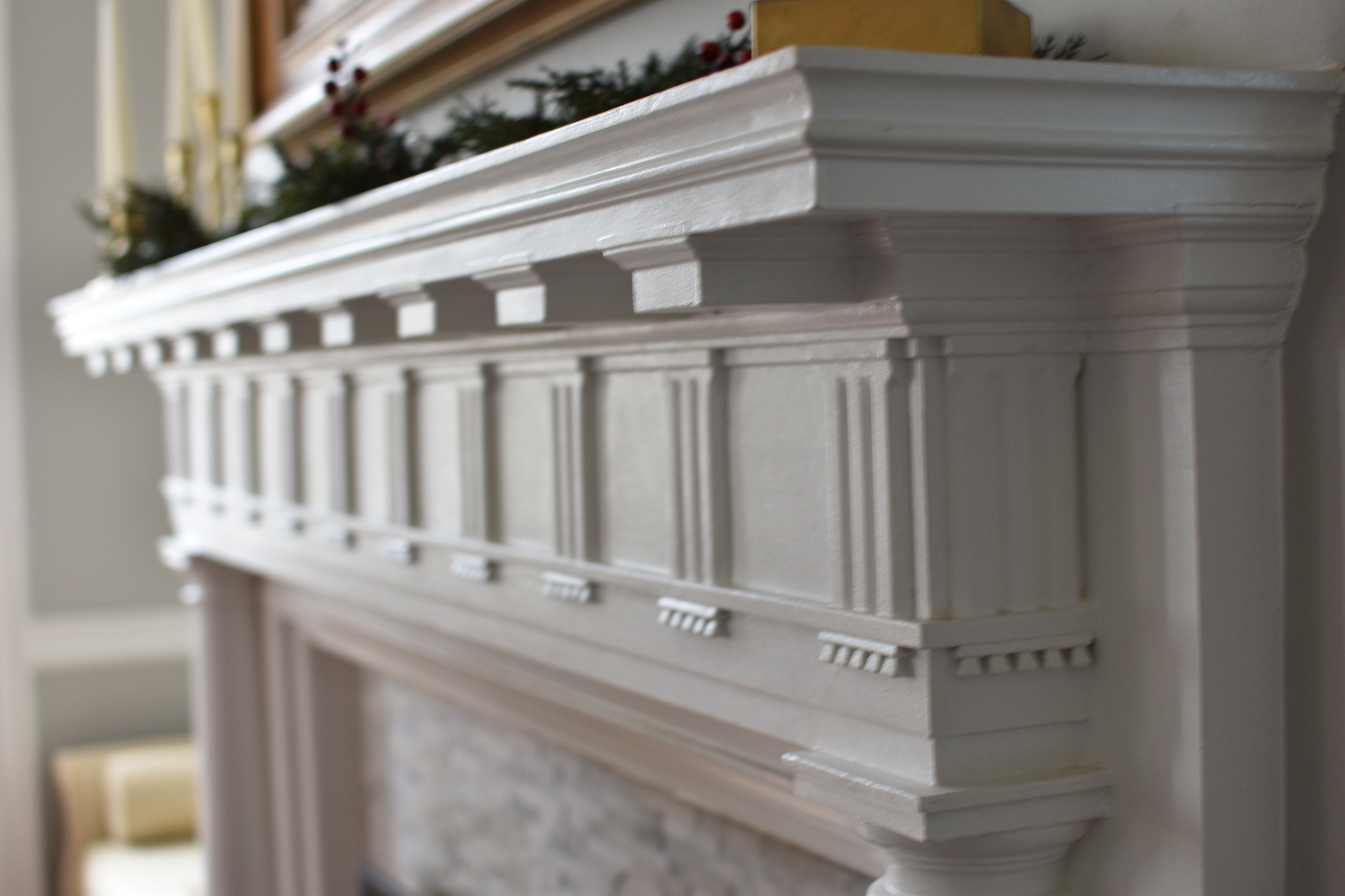 The original plaster fireplace mantel